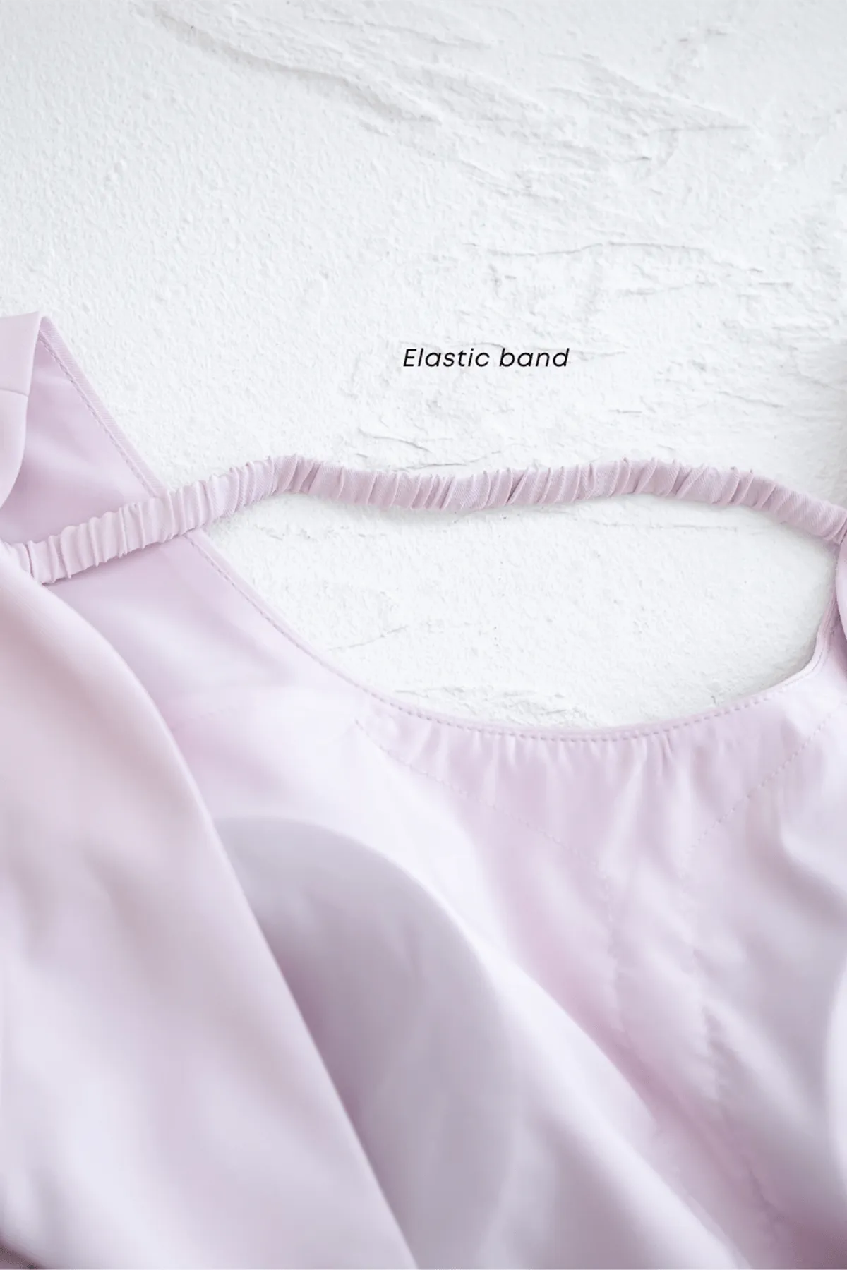 BEBE PADDED BOW OPEN BACK TOP IN PINK