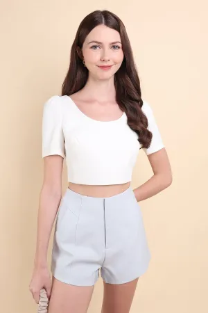 BEBE PADDED BOW OPEN BACK TOP IN WHITE