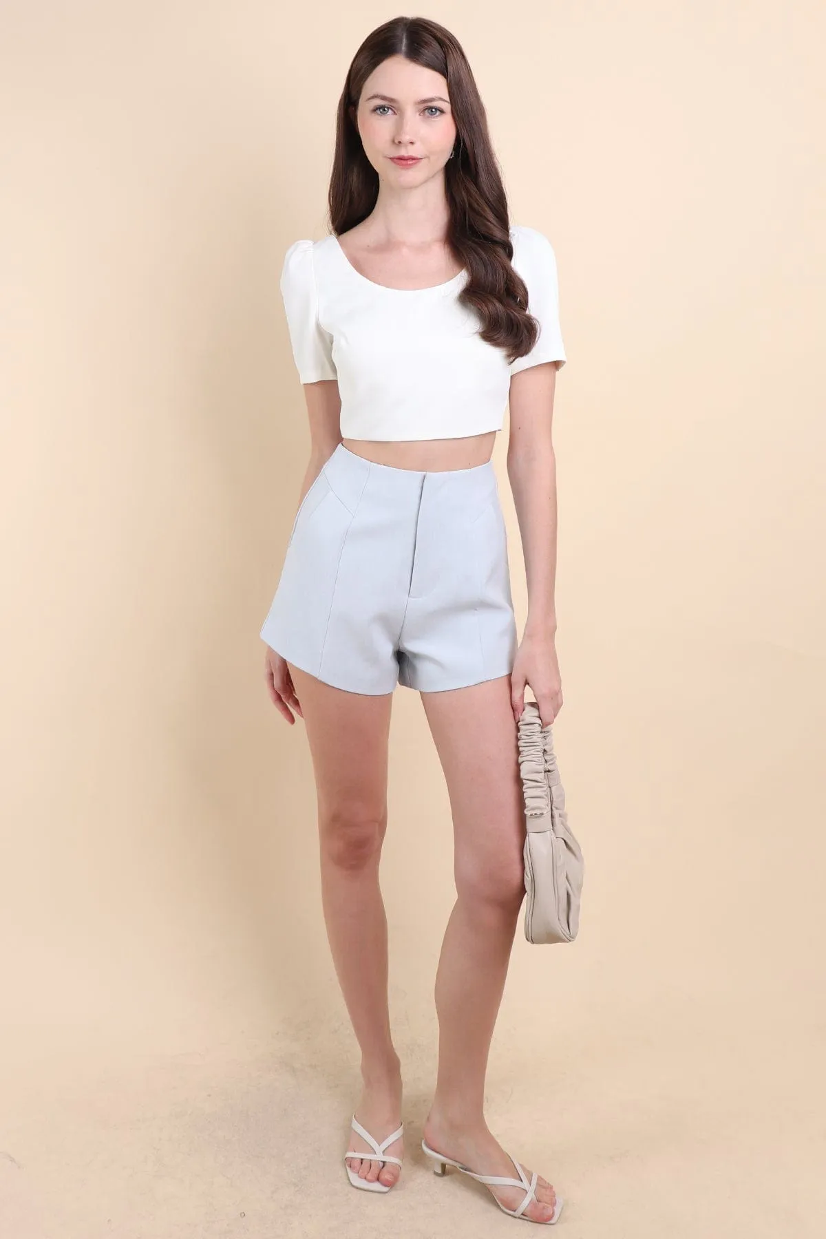 BEBE PADDED BOW OPEN BACK TOP IN WHITE